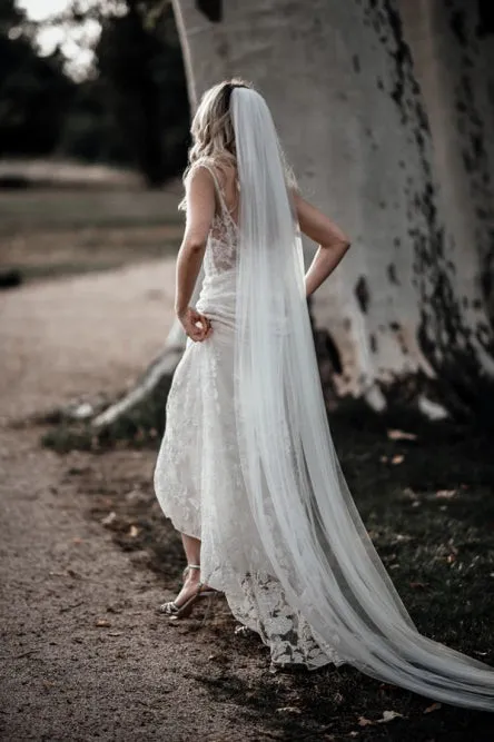 Mermaid/Trumpet Spaghetti Straps Sweep Train Backless Wedding Dress with Appliques OHD270